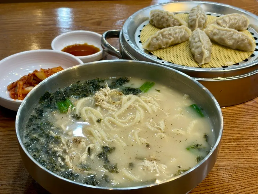 Solo table setting with dak kalguksu and galbi mandu