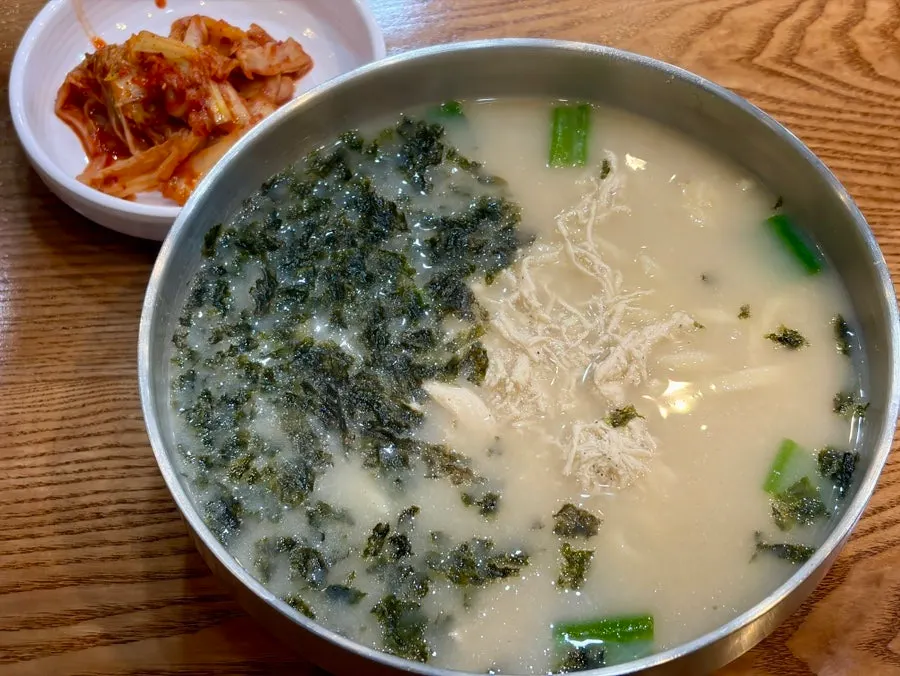 Dak kalguksu and mandu set on the table