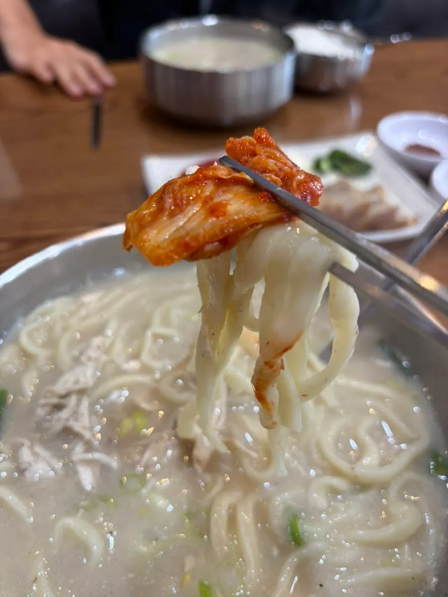 Slightly fermented kimchi served alongside the kalguksu