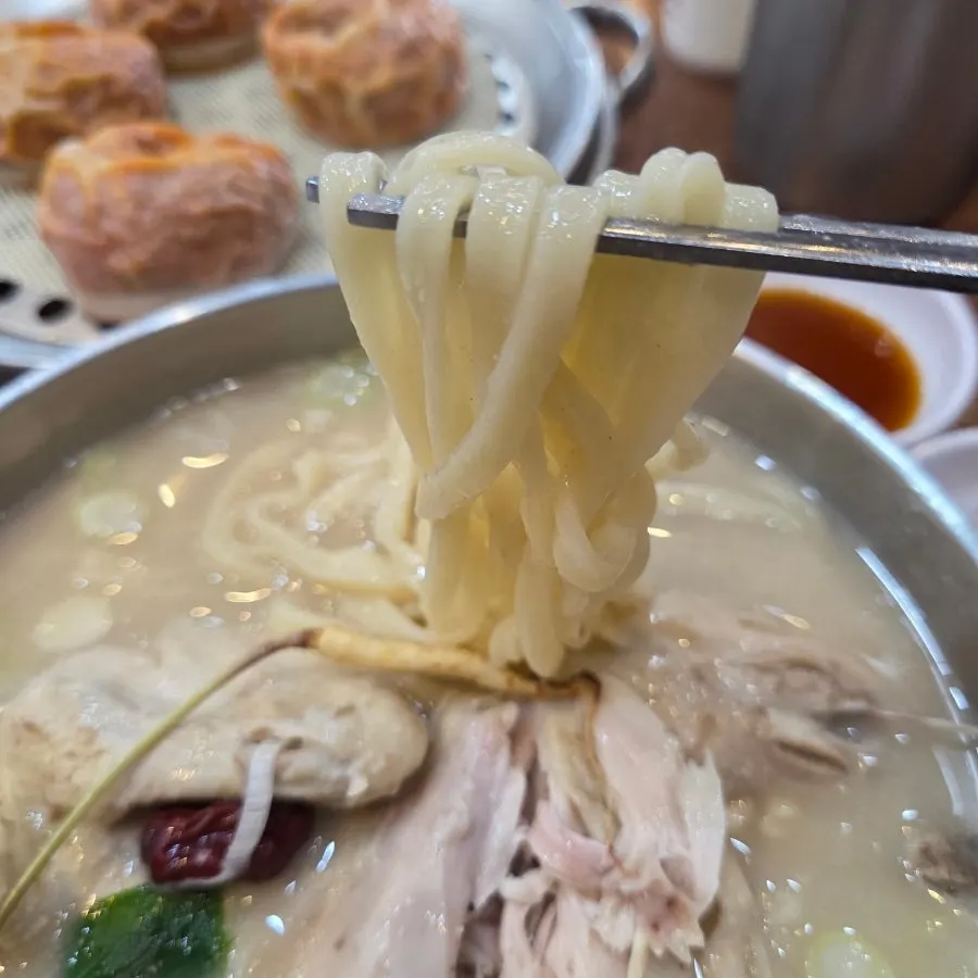 Chicken and kalguksu noodles served together
