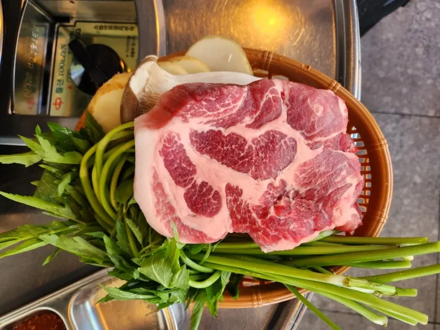 Aged pork neck grilled to a golden brown