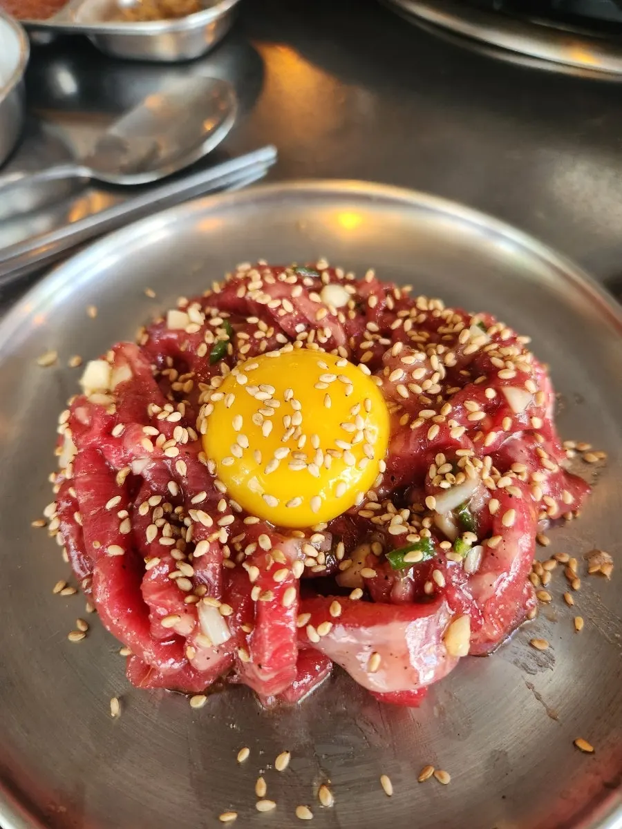 Premium Korean beef yukhoe ordered with pork neck