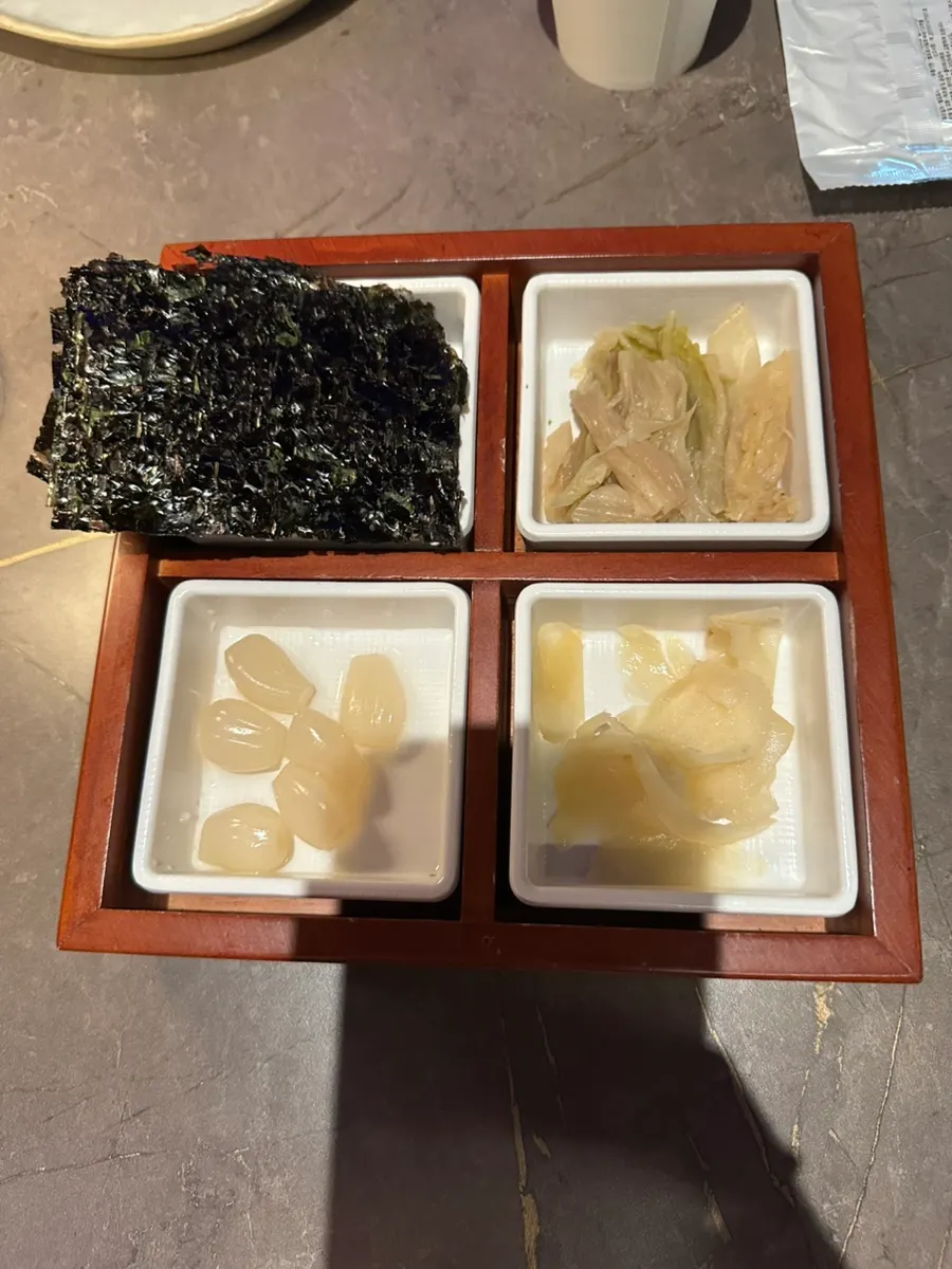 Seaweed and white kimchi served with aged sashimi