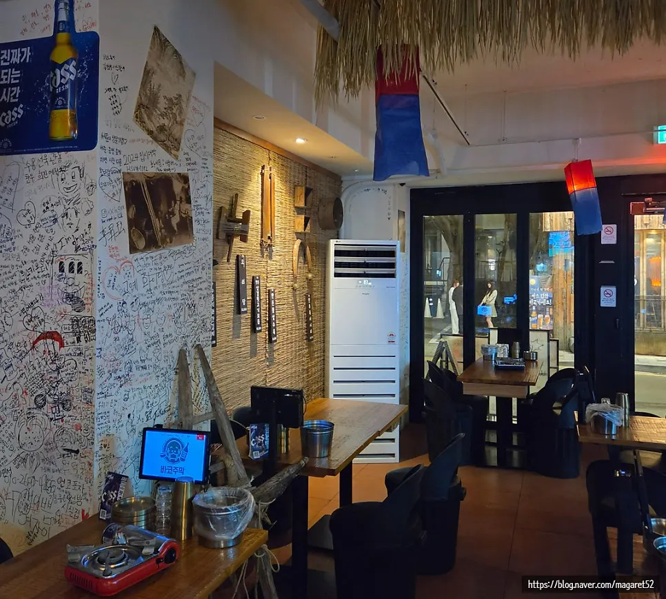 Interior view of Bako Jumak with tavern-style ambiance