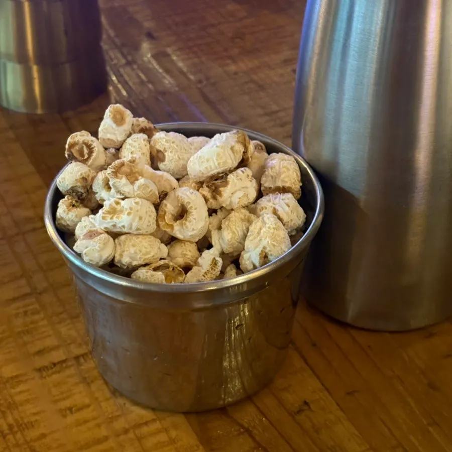 Popped corn kernels served as a basic side snack