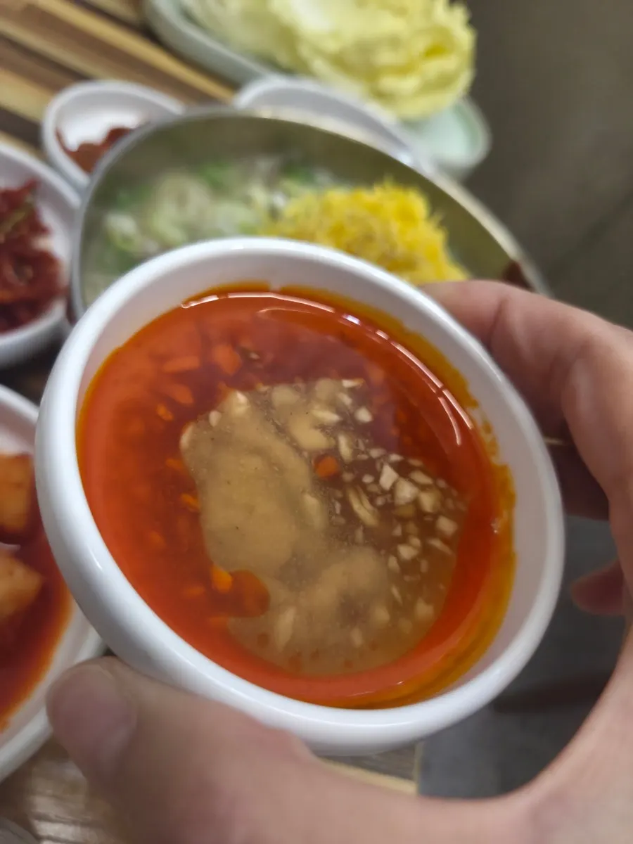 Kalguksu meat dipped in the house special sauce