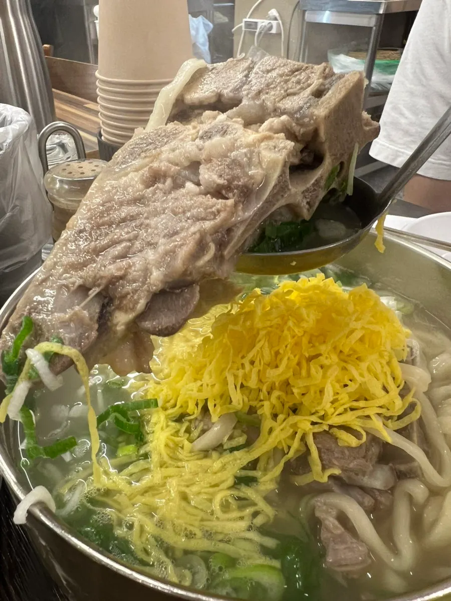 Large chunk of meat in the bone kalguksu