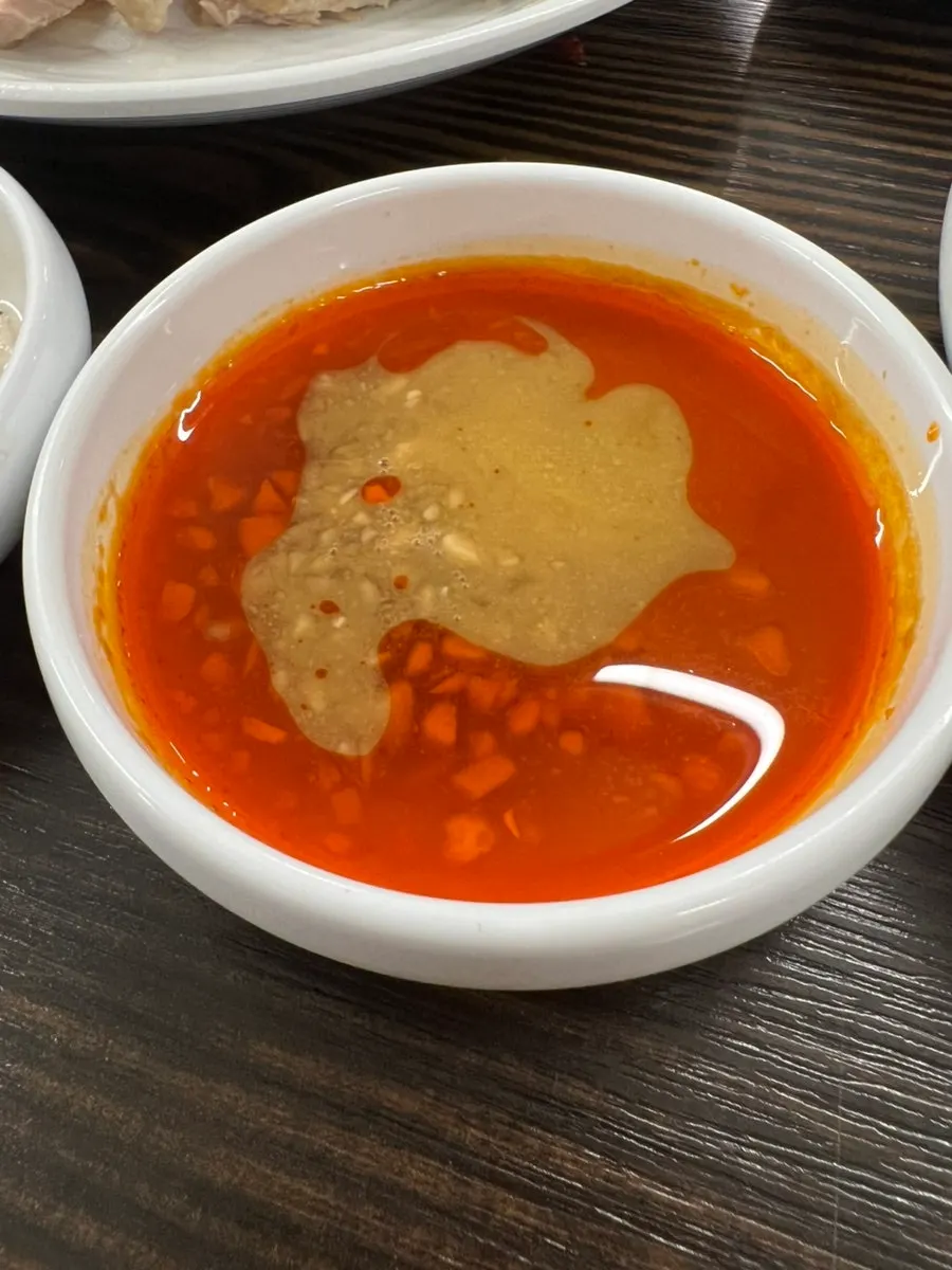 Close-up of the bone kalguksu broth and noodles