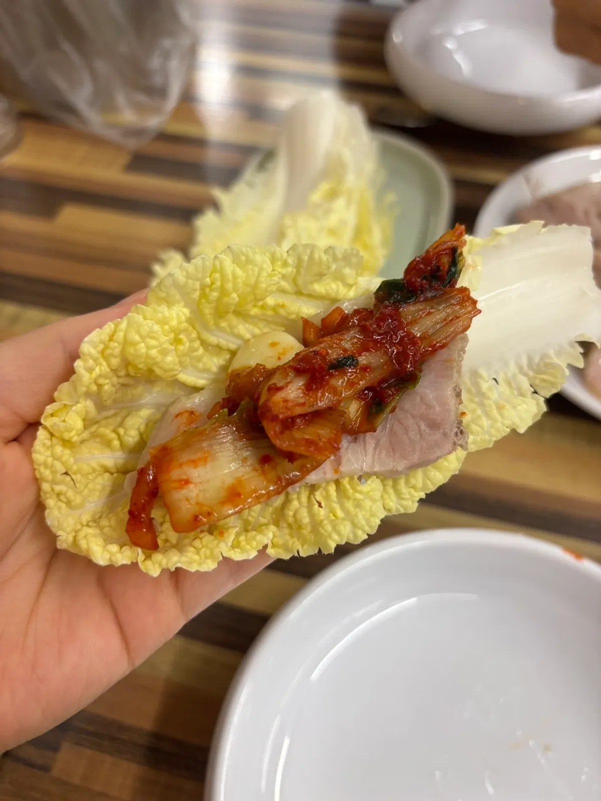 Bossam suyuk eaten with salted shrimp