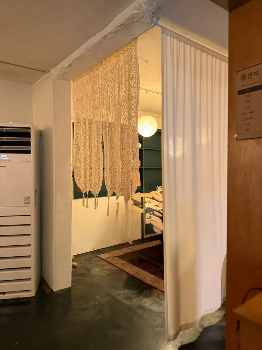 An inner table for six screened by curtains