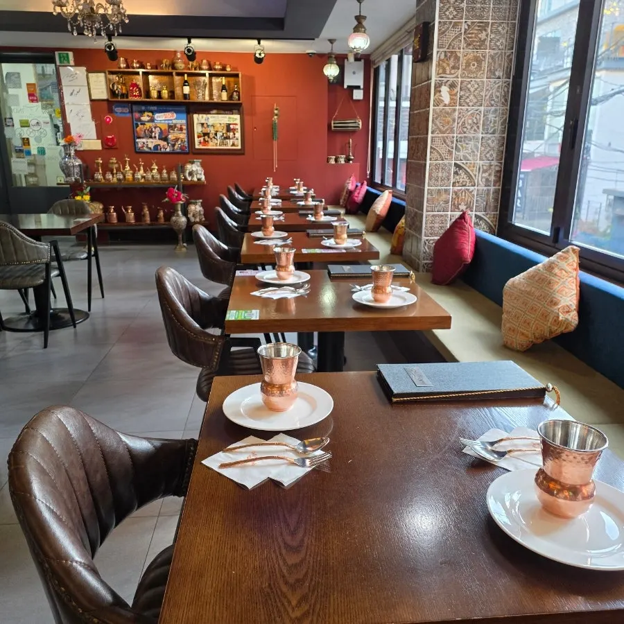 A table set with cups and plates