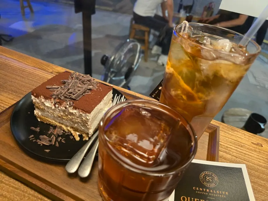 Rooibos tea and coffee side by side at the bar seats
