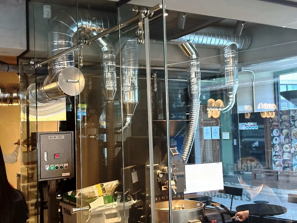 Coffee beans and brewing tools displayed at the counter