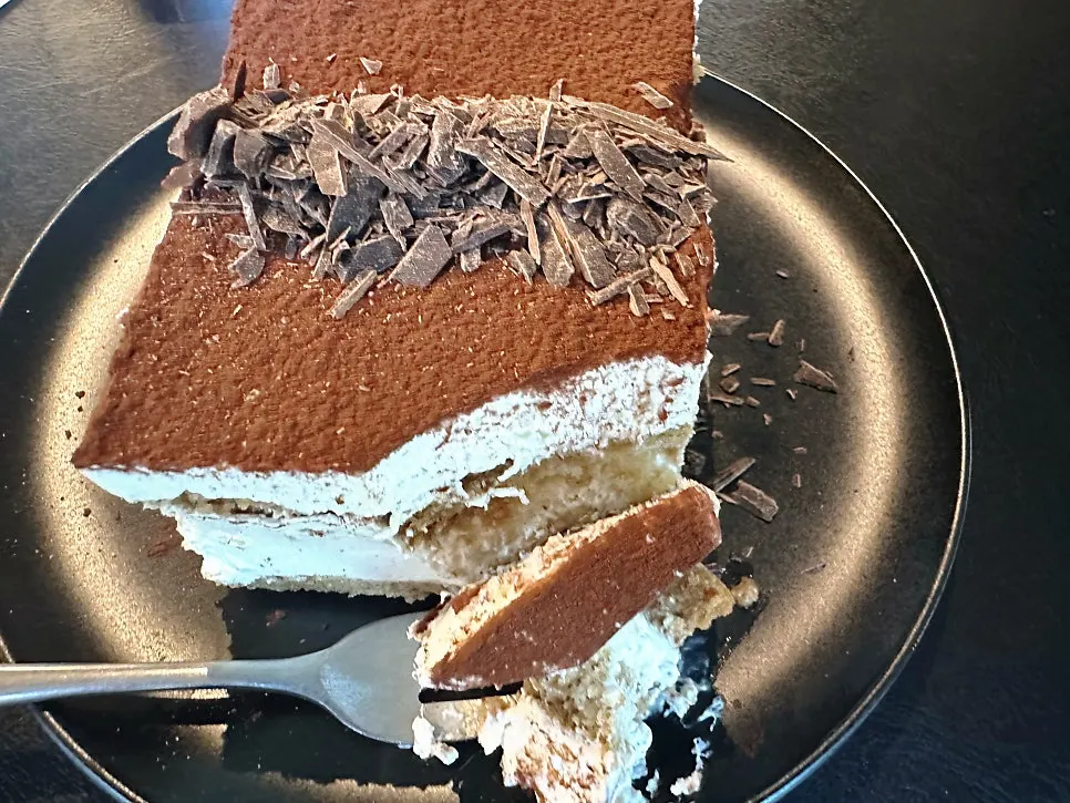 A forkful of soft tiramisu sponge