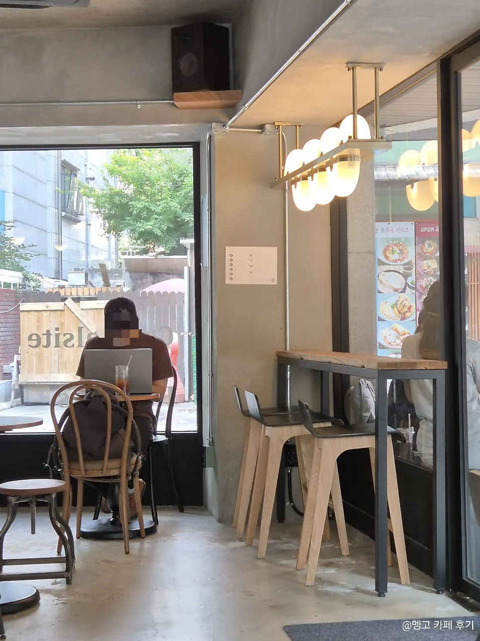 Cozy, compact café interior seating