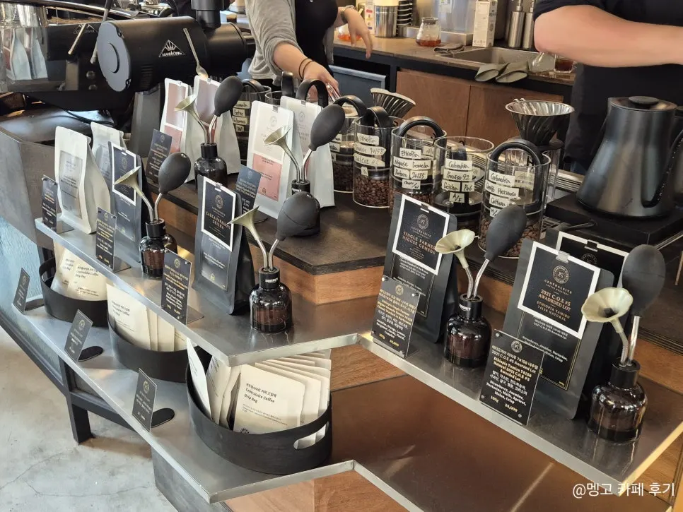 Sign showing drip coffee bean types and prices