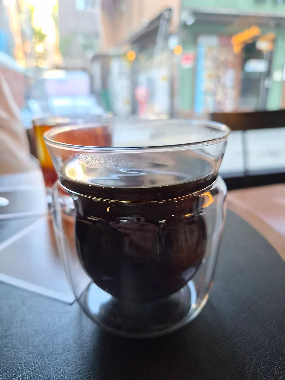 Two drip coffees compared side by side, showing different colors
