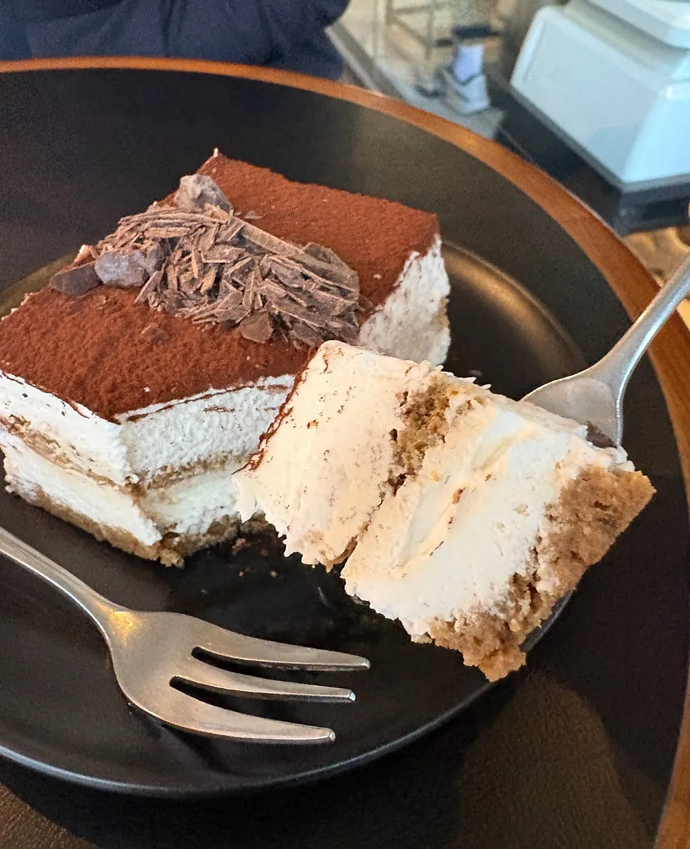 A plated slice of classic tiramisu