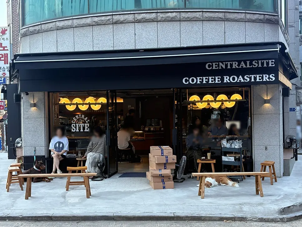 Guests sipping coffee by the window