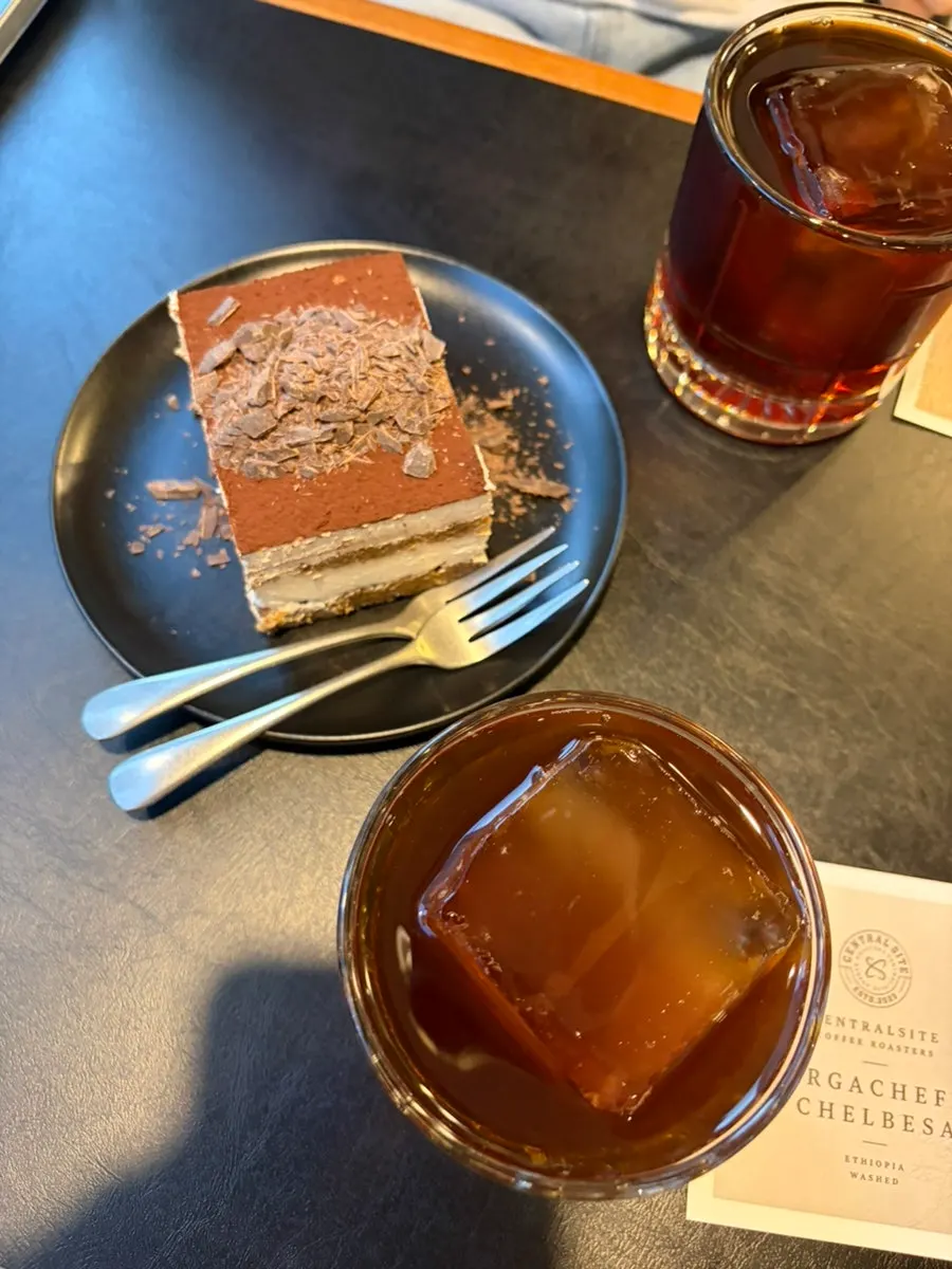 Bean info card served with the drip coffee