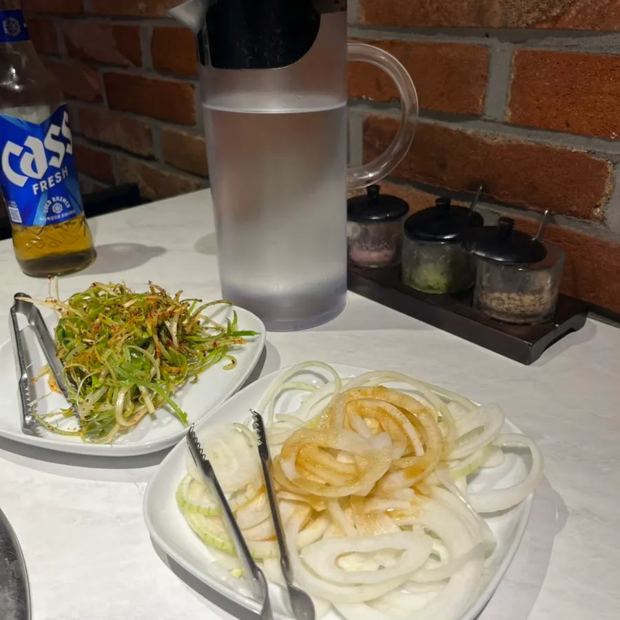 Scallion salad and pickled onions