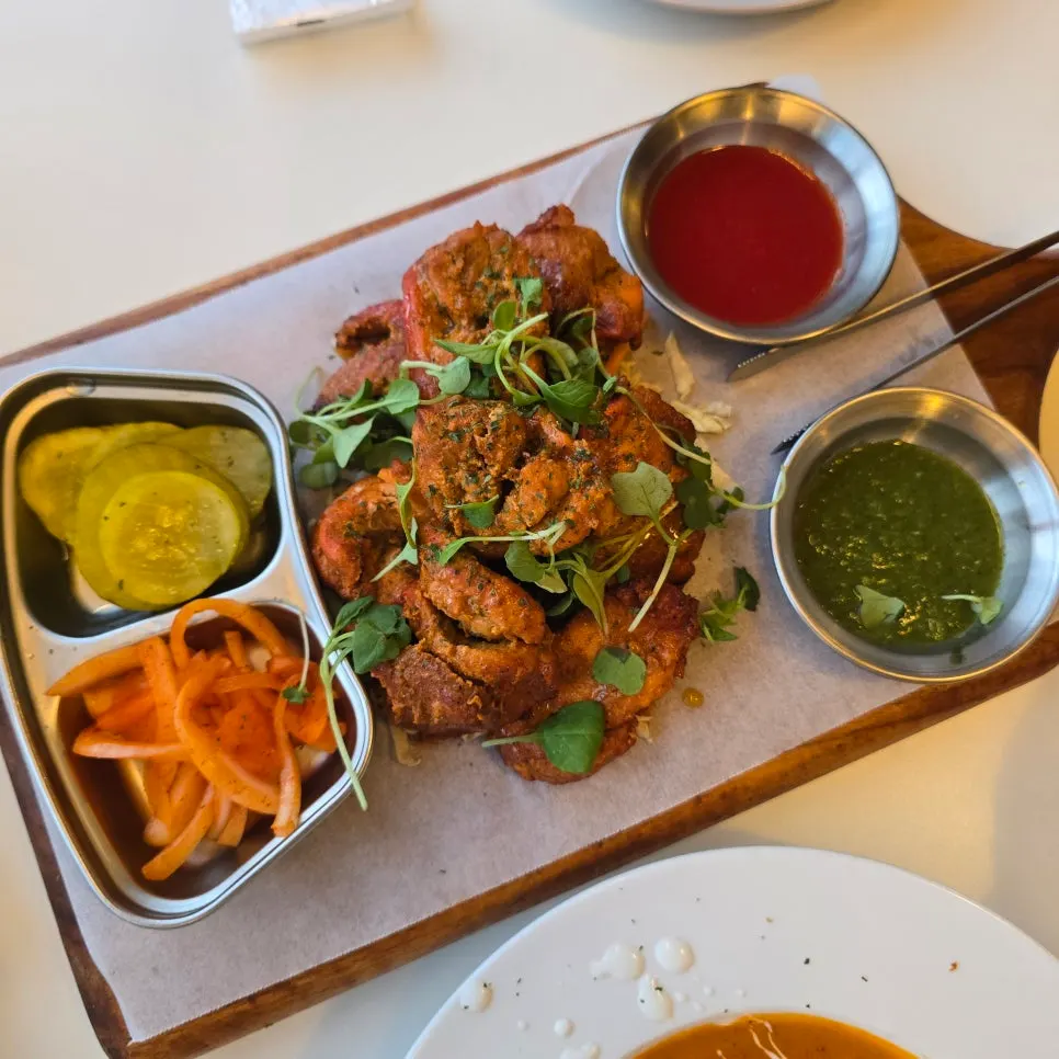 Order of chicken tikka, chicken makhani and butter garlic naan