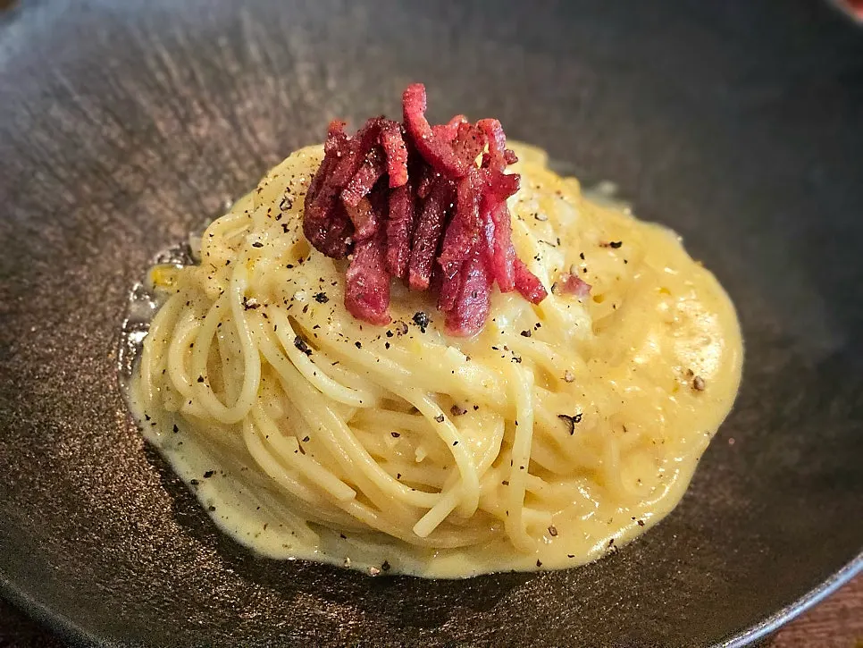 Pasta served with complimentary bread