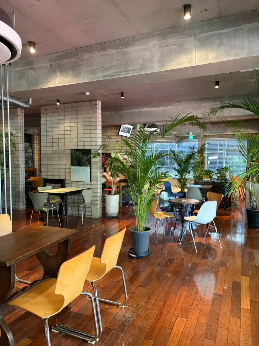 Café seating with brown floors and colorful furniture