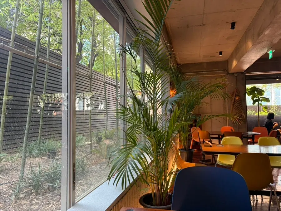 Seat next to the floor-to-ceiling windows on the first floor