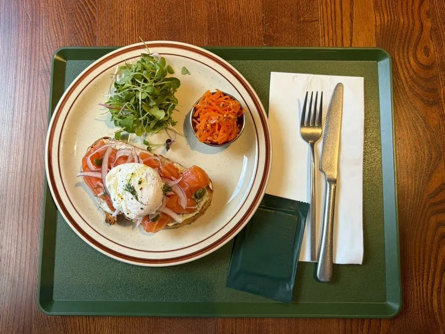 A plate of creamy salmon poached egg Benedict