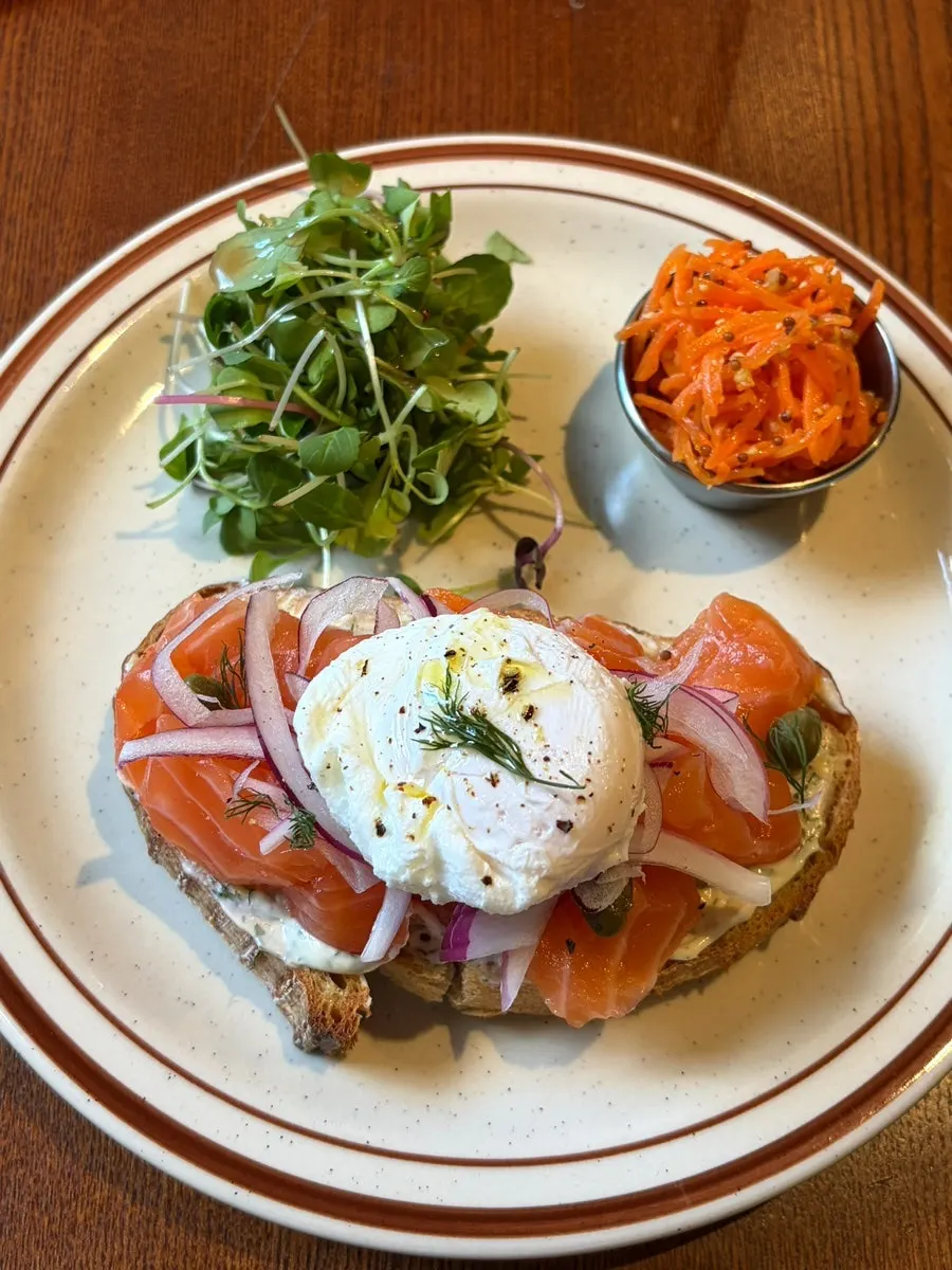 Open sandwich with salmon and poached egg on sourdough