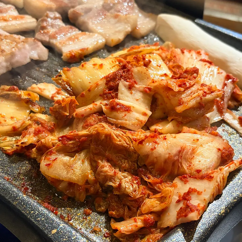 Kimchi cooking in pork fat