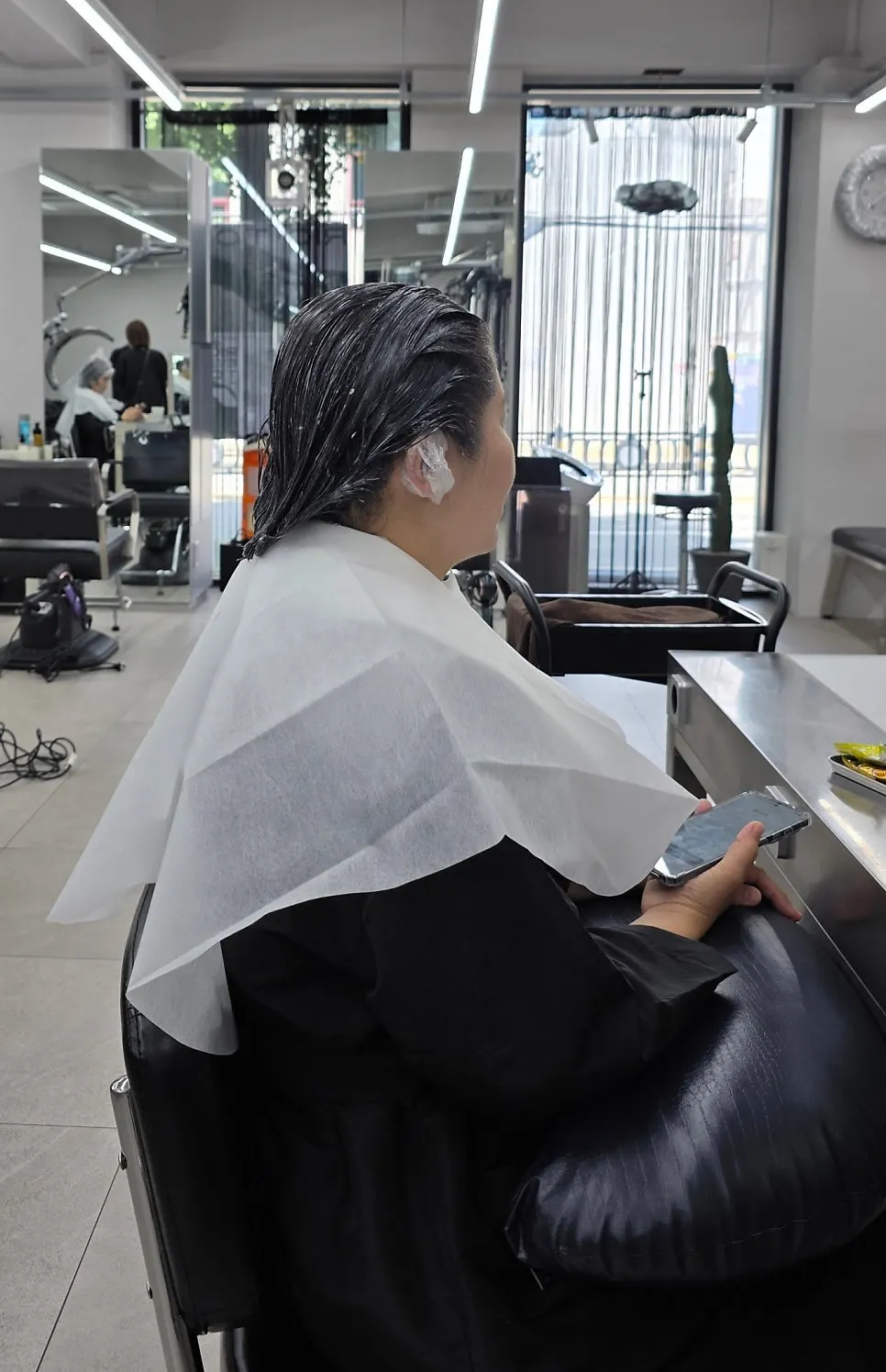 Applying color mainly to the roots
