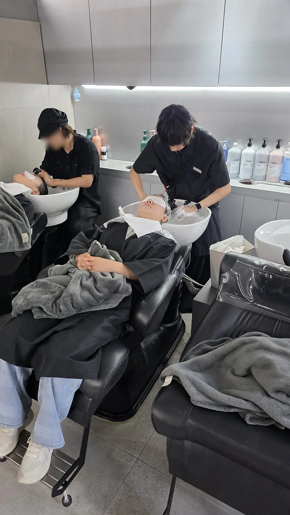 Applying the matte brown dye to neutralize red tones