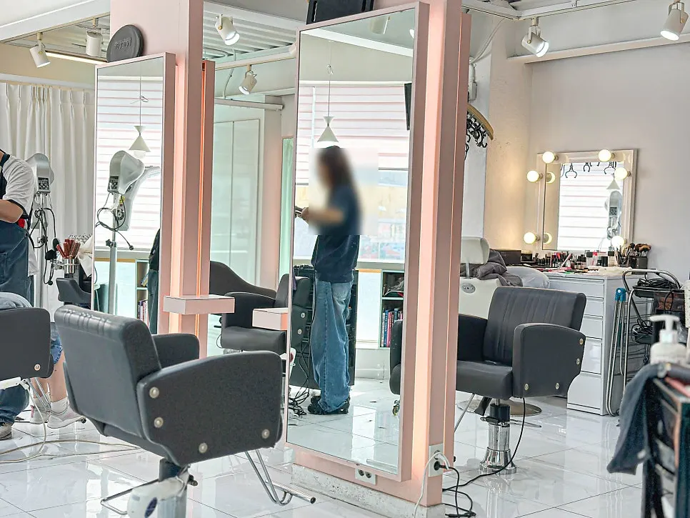 Inside the salon preparing for a perm service