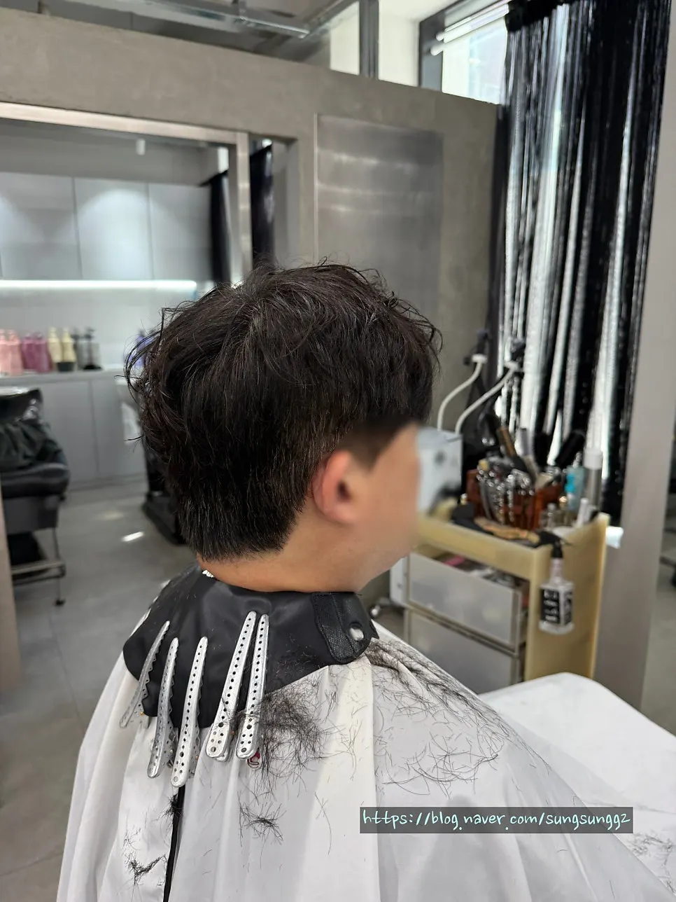 Final view of the calm, neat texture perm