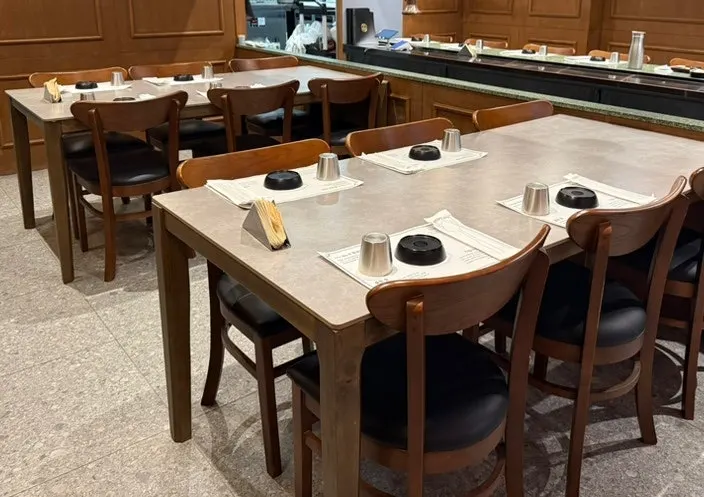 Interior view of the restaurant with bar and table seating