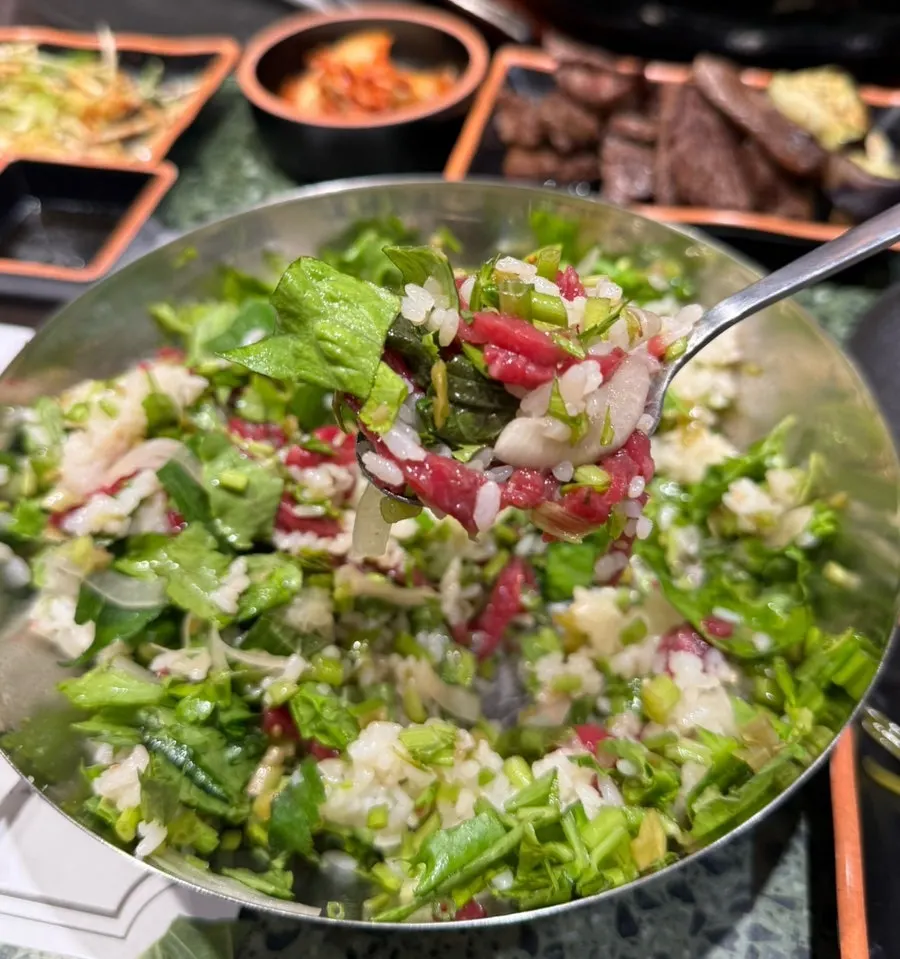 Yukhoe bibimbap loaded with beef tartare and vegetables