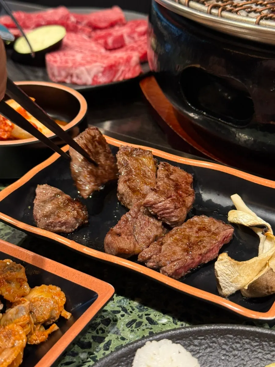 Table set for a hanwoo omakase anniversary meal in Hapjeong