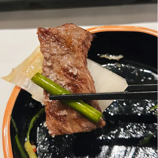 Close-up of tender, well-grilled hanwoo