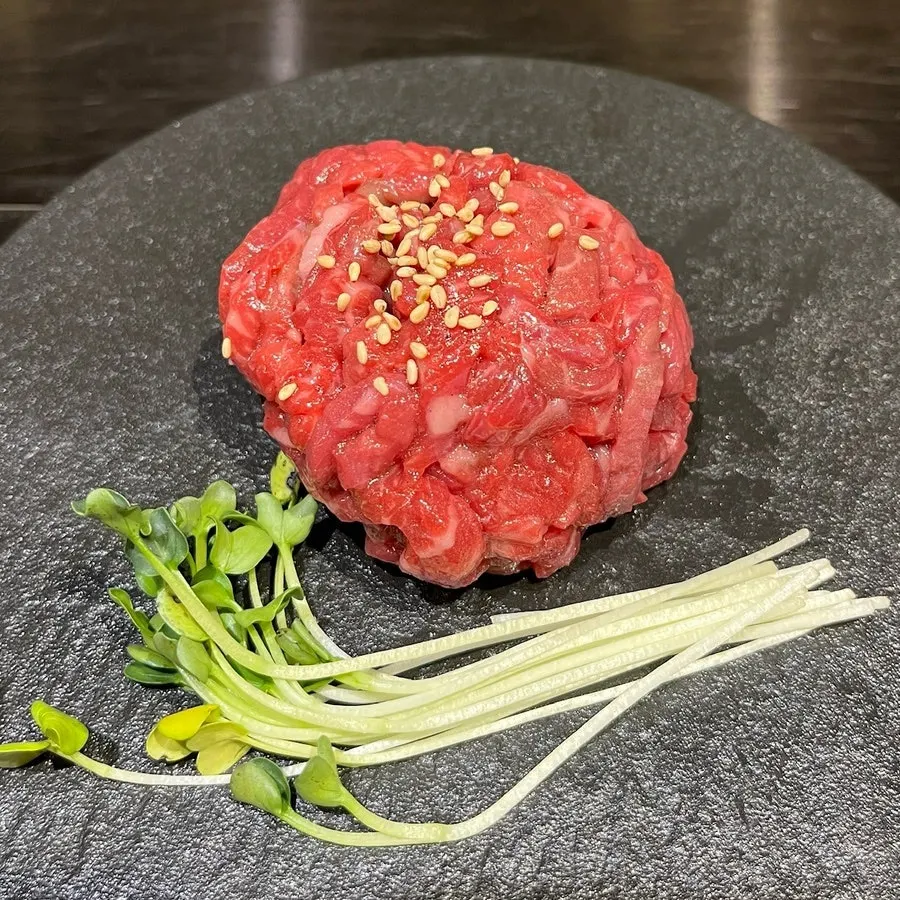 A plate of ankimo served as a side dish