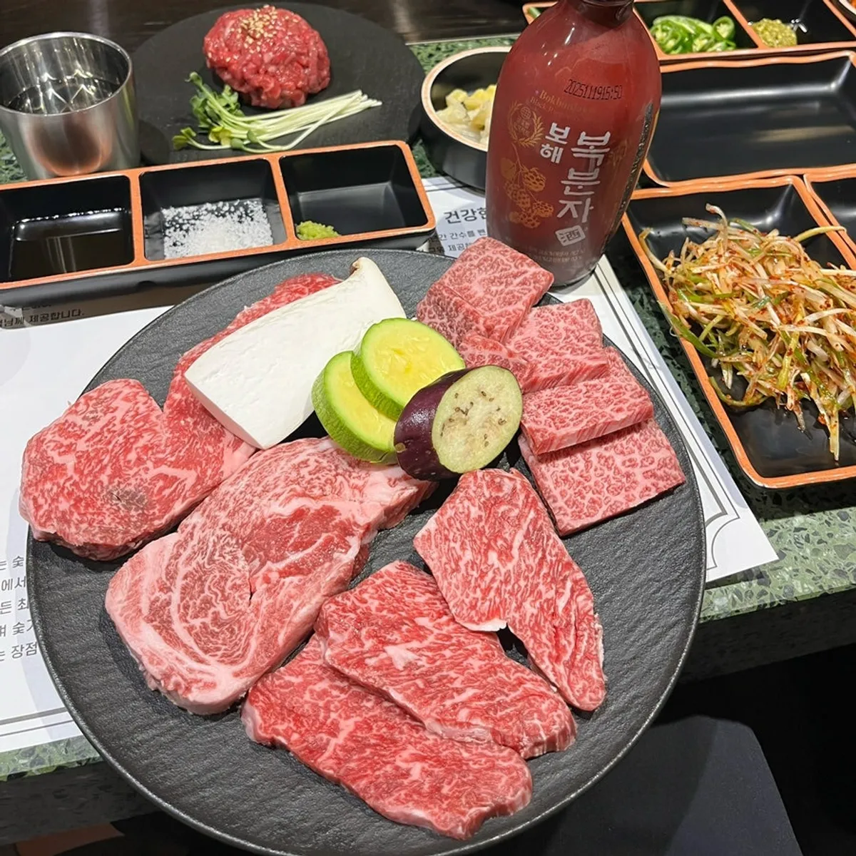 Grill and hanwoo special set placed at the bar seating