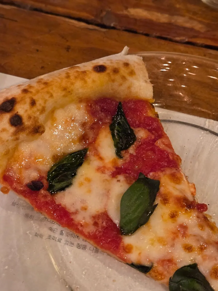 Slice of Diavola topped with chorizo