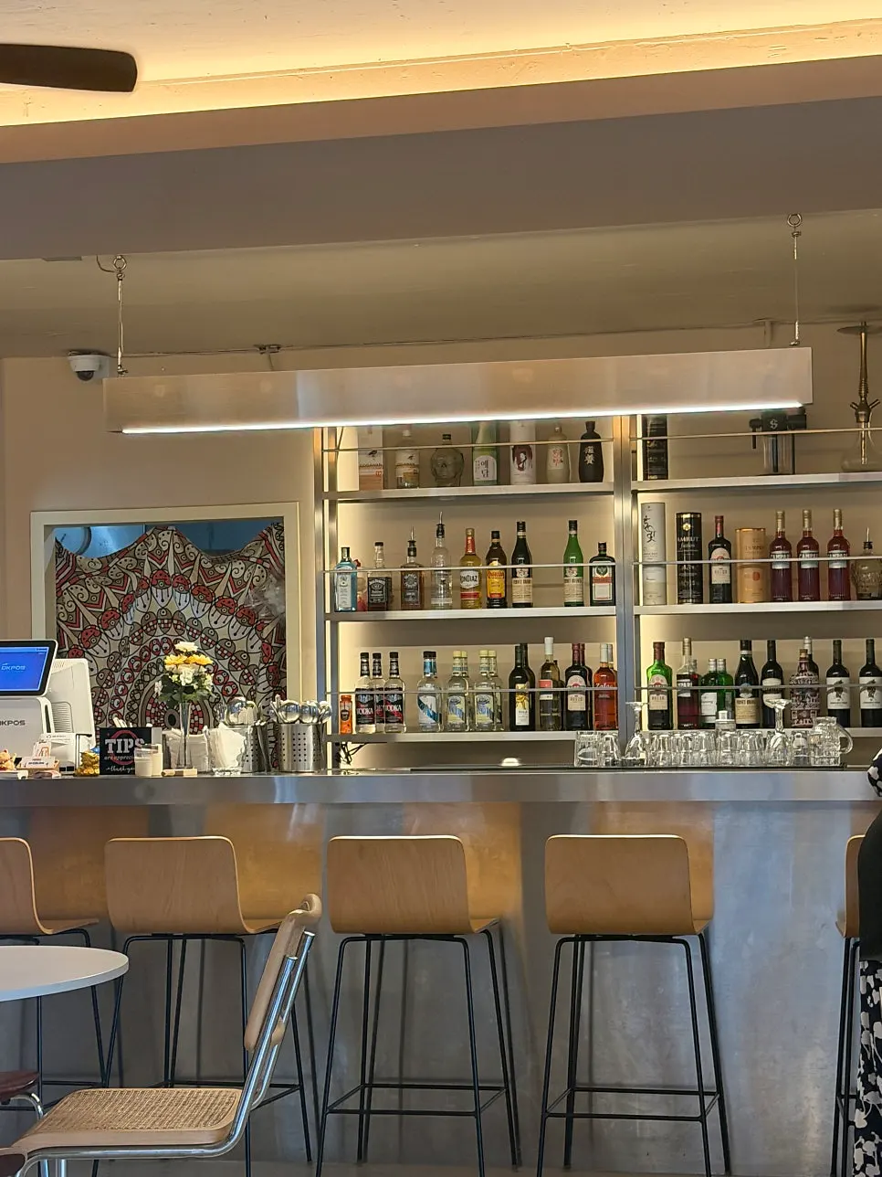 Mandala Indian Lounge with floor-to-ceiling windows and a modern interior