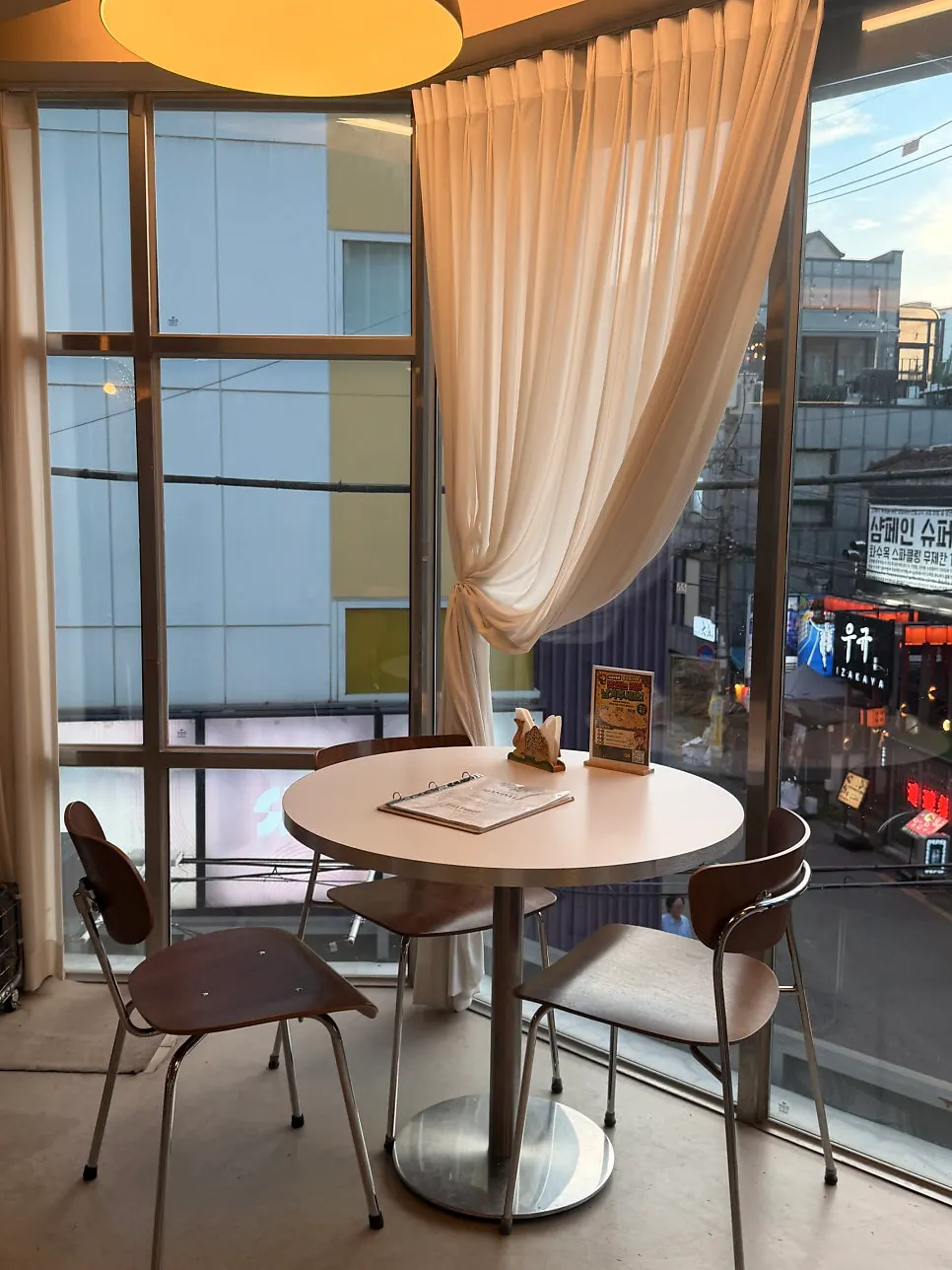 Interior of an Indian restaurant open from day to night