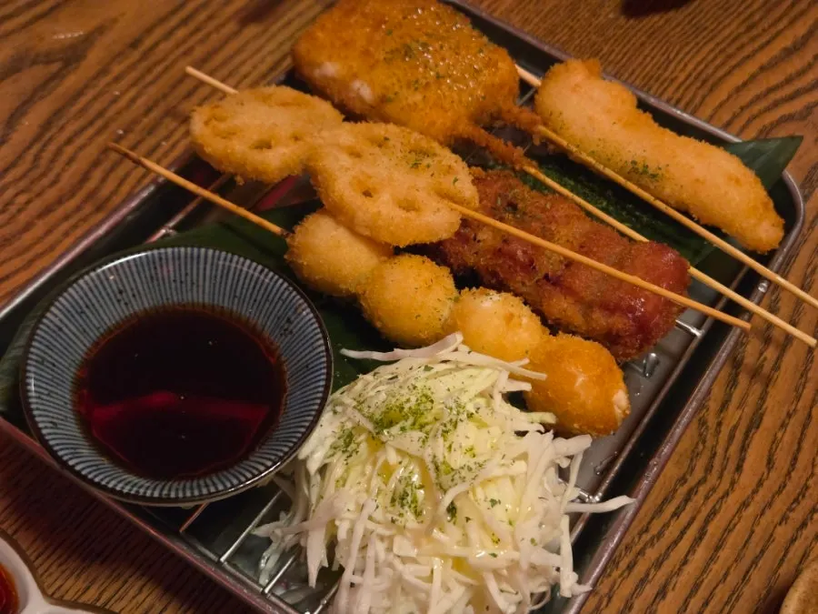Plate of charcoal-grilled yakitori skewers