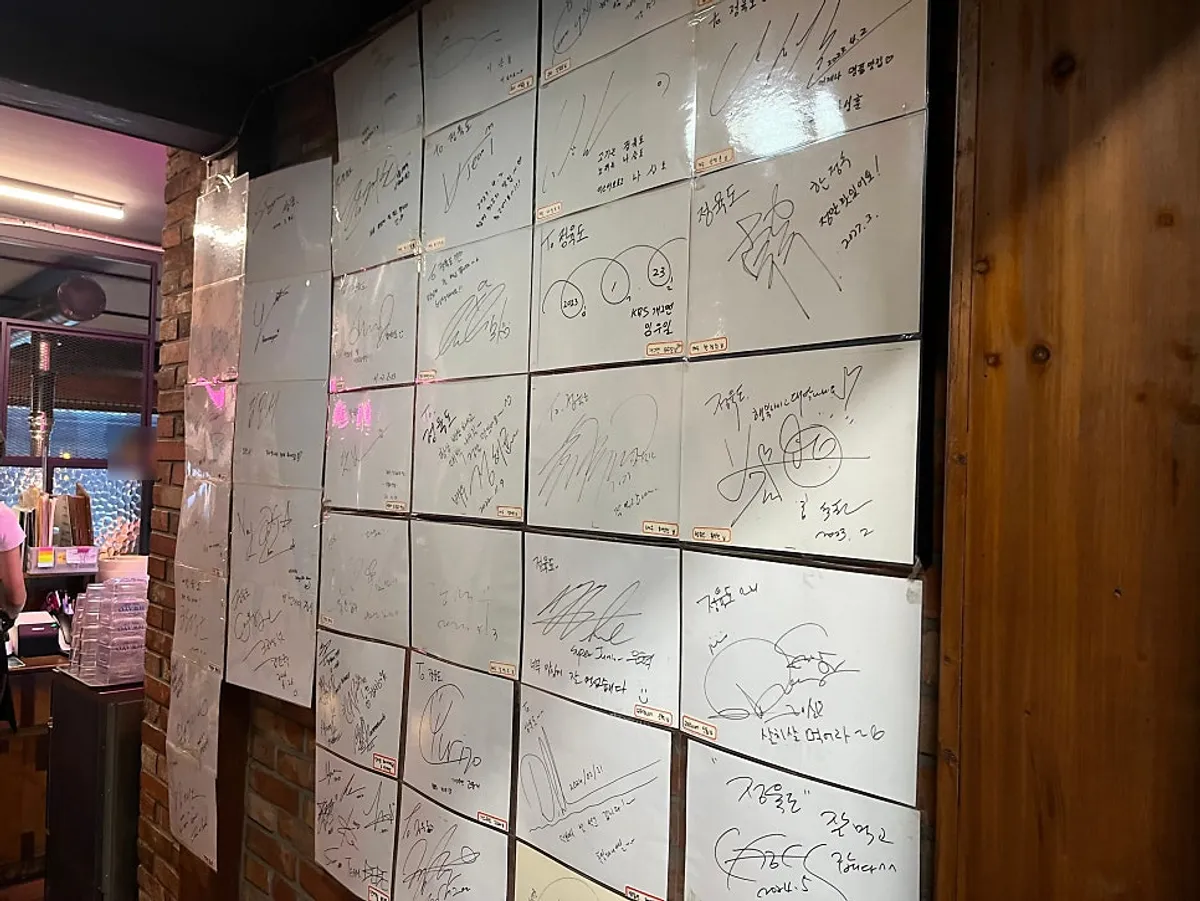 Celebrity autographs on the wall at Jeongyukdo