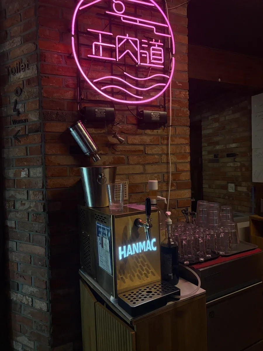 Jeongyukdo's meat aging cellar lit with purple lighting