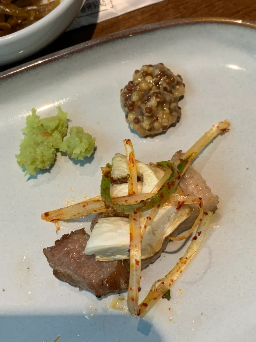 A fully grilled piece of the Hanwoo pork set