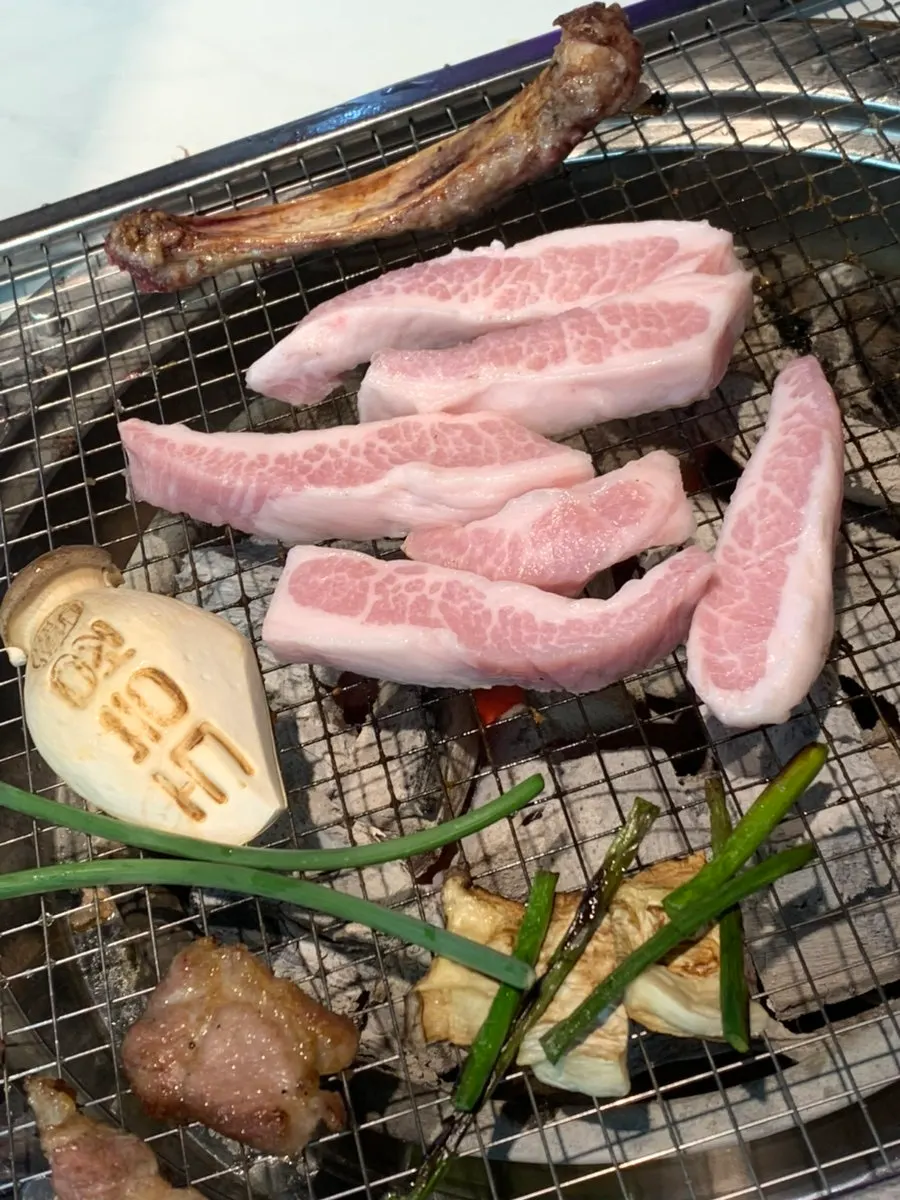 Raw pork jowl ordered as an extra serving